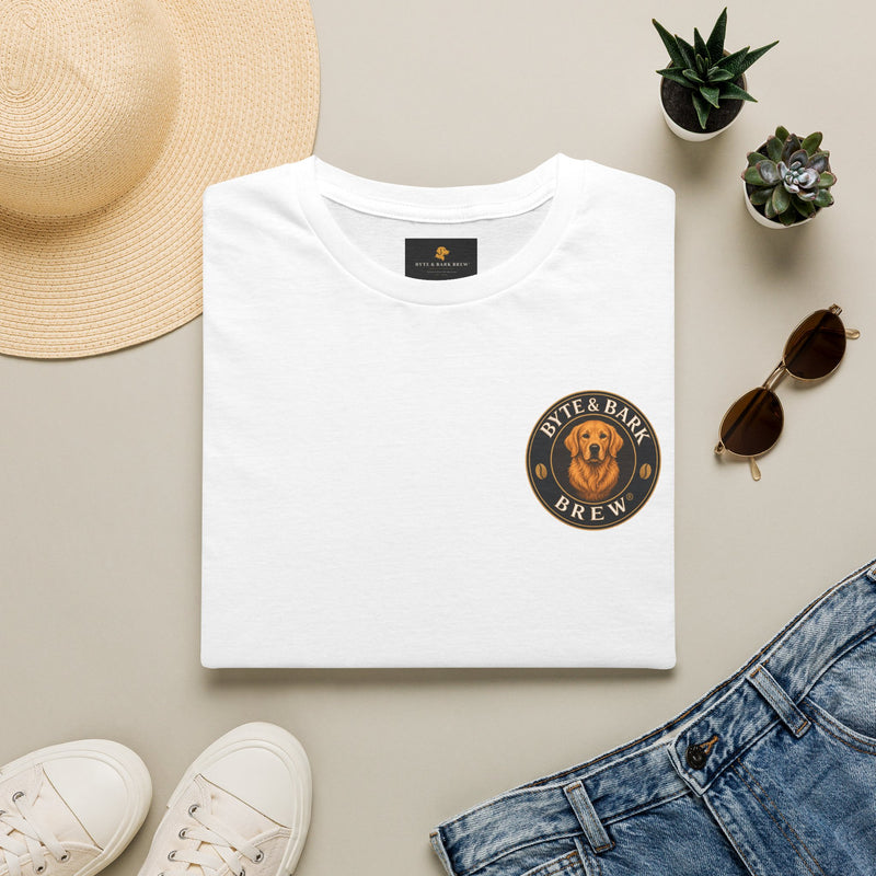 Folded white Byte & Bark Brew® t-shirt showing neckline label and partial dog logo with hat and sunglasses