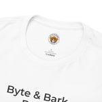 White crew-neck t-shirt showing small Byte & Bark Brew® circular neck logo and partial front text