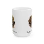 Front close-up of white ceramic mug showing two partial golden retriever faces and Byte & Bark Brew® text
