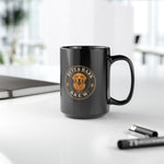 Close-up of black ceramic mug showing Byte & Bark Brew® circular dog logo and handle