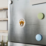 Oval Byte & Bark Brew® logo sticker with three dog heads above steaming cup on stainless surface