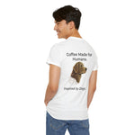 Model turned over shoulder wearing white t-shirt with printed 'Coffee Made for Humans.' text and dog graphic