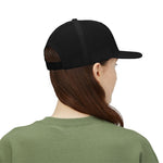 Rear three-quarter view of black mesh trucker hat with adjustable snapback on model