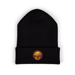 Black ribbed knit beanie with folded cuff and small circular embroidered dog patch