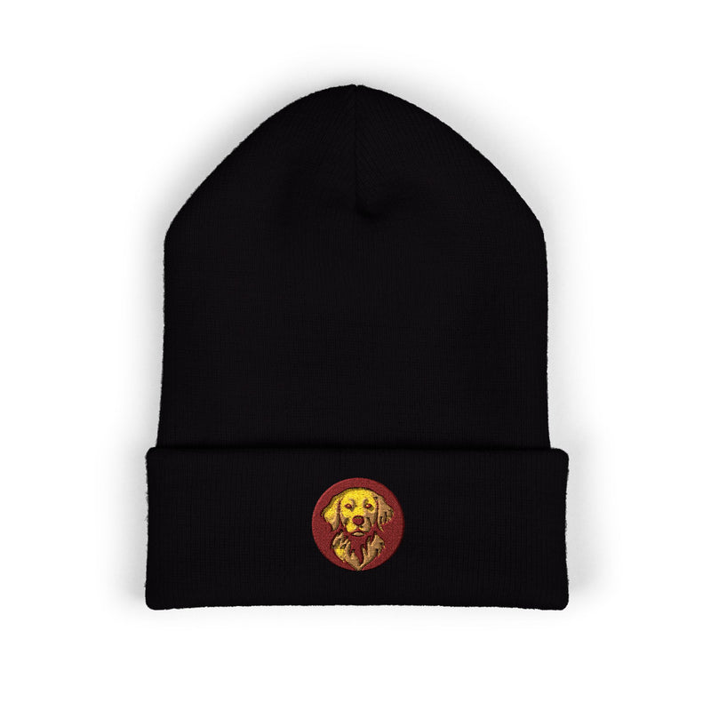 Black ribbed knit beanie with folded cuff and small circular embroidered dog patch