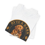 Folded white crewneck tee with Byte & Bark Brew® circular dog-and-coffee graphic