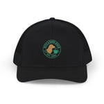 Top-front of black trucker hat with embroidered Byte & Bark Brew® circular dog and cup logo