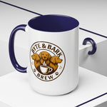 White mug with navy blue rim and handle showing Byte & Bark Brew® logo with dogs