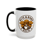 White ceramic mug with black handle and Byte & Bark Brew® three-dog coffee logo