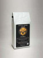 White coffee bag with Byte & Bark Brew® black label, dog logo and 'Colombia' text