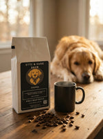 Byte & Bark Brew® Uganda coffee bag with scattered beans, steaming black mug and dog