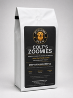 White 2 lb coffee bag with black label showing Byte & Bark Brew® logo and Colt's Zoomies