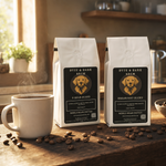 Two Byte & Bark Brew® whole bean bags, one dark roast and one light roast, scattered coffee beans