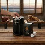 Hand placing pod into Keurig with Byte & Bark Brew® pod box and two pods