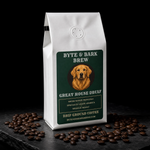 White sealed coffee bag with Byte & Bark Brew® green label featuring golden retriever portrait