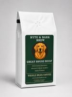 White sealed whole-bean coffee bag with green label featuring Byte & Bark Brew® golden retriever portrait