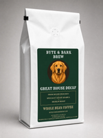 White upright coffee bag with green Byte & Bark Brew® label featuring golden retriever and 'Great House Decaf'