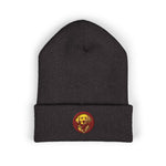 Dark charcoal knit beanie with folded cuff featuring small round embroidered golden retriever patch